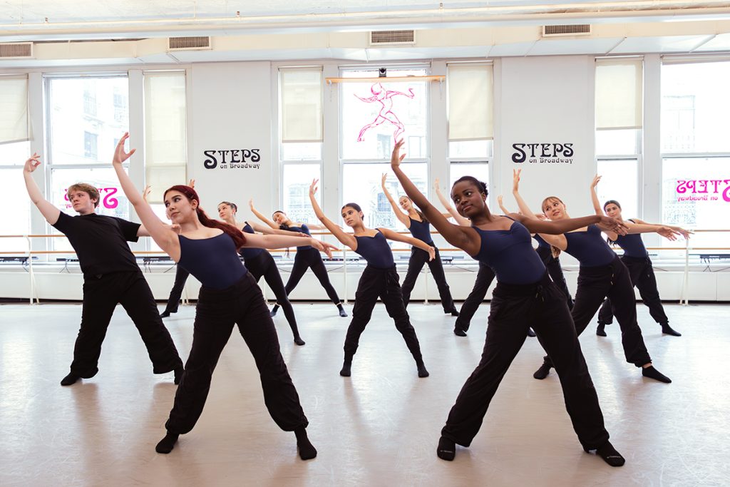 A large group of Steps Academy Pre Professional dancers in a Jazz class