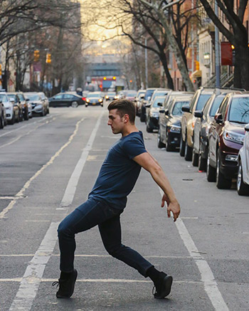 Andrew Winans seen dancing in a crosswalk in NYC