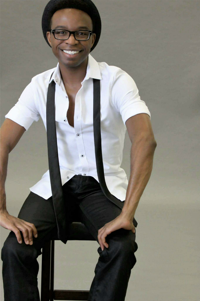 Cornell Callender sitting on a stool